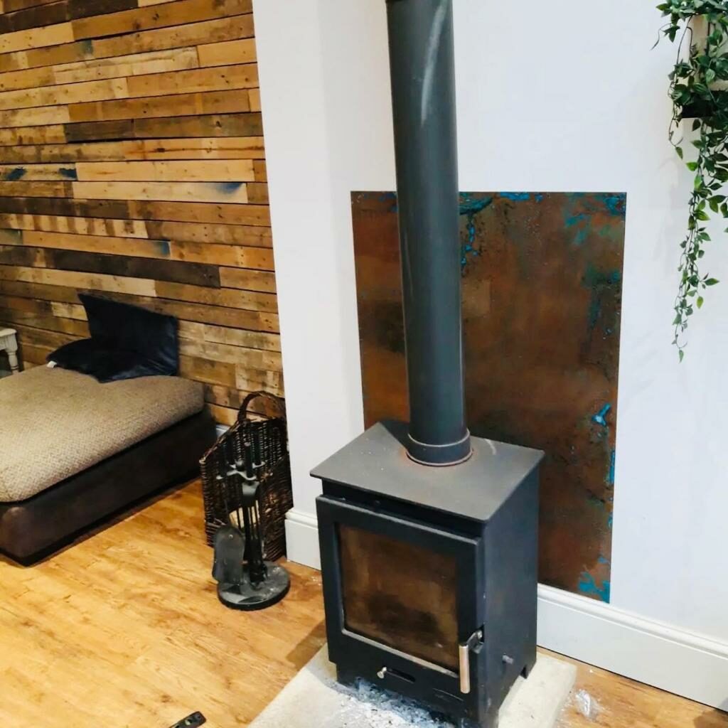 Copper Wall Panels: The Perfect Partner to Wood Burning Stoves - Halman  Thompson
