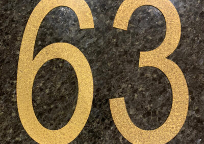 large custom made aged brass numbers