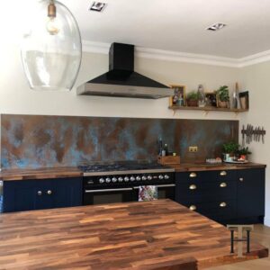 long copper verdigris splashback in kitchen