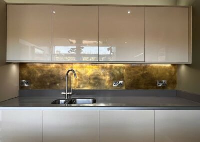 bronzed brass kitchen backsplash