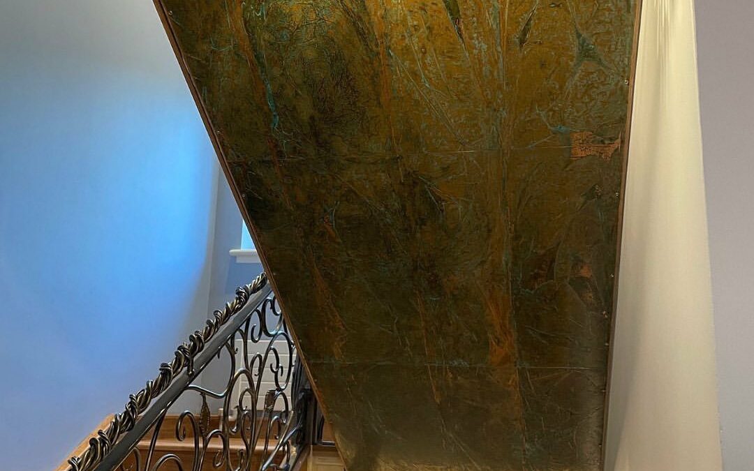 Aged Copper Panels Under Staircase