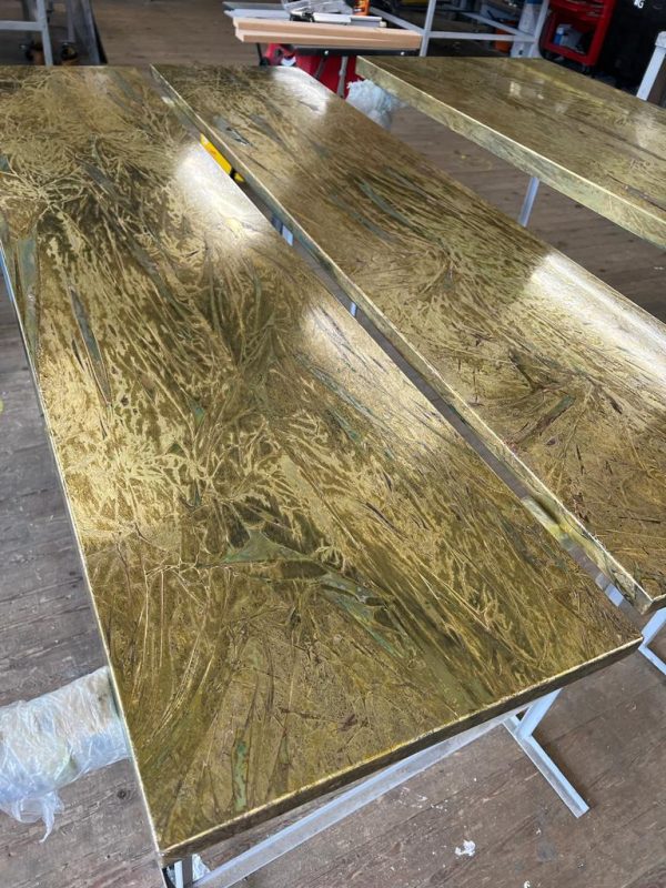 aged brass table top with stain glass effect in patina