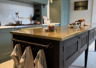 antiqued brass kitchen table in olive colour kitchen